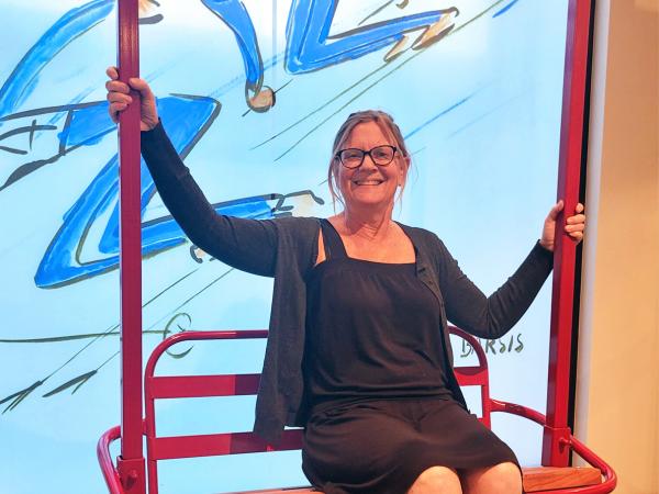 Mary Tyson in a chairlift at the Wood River Museum of History & Culture